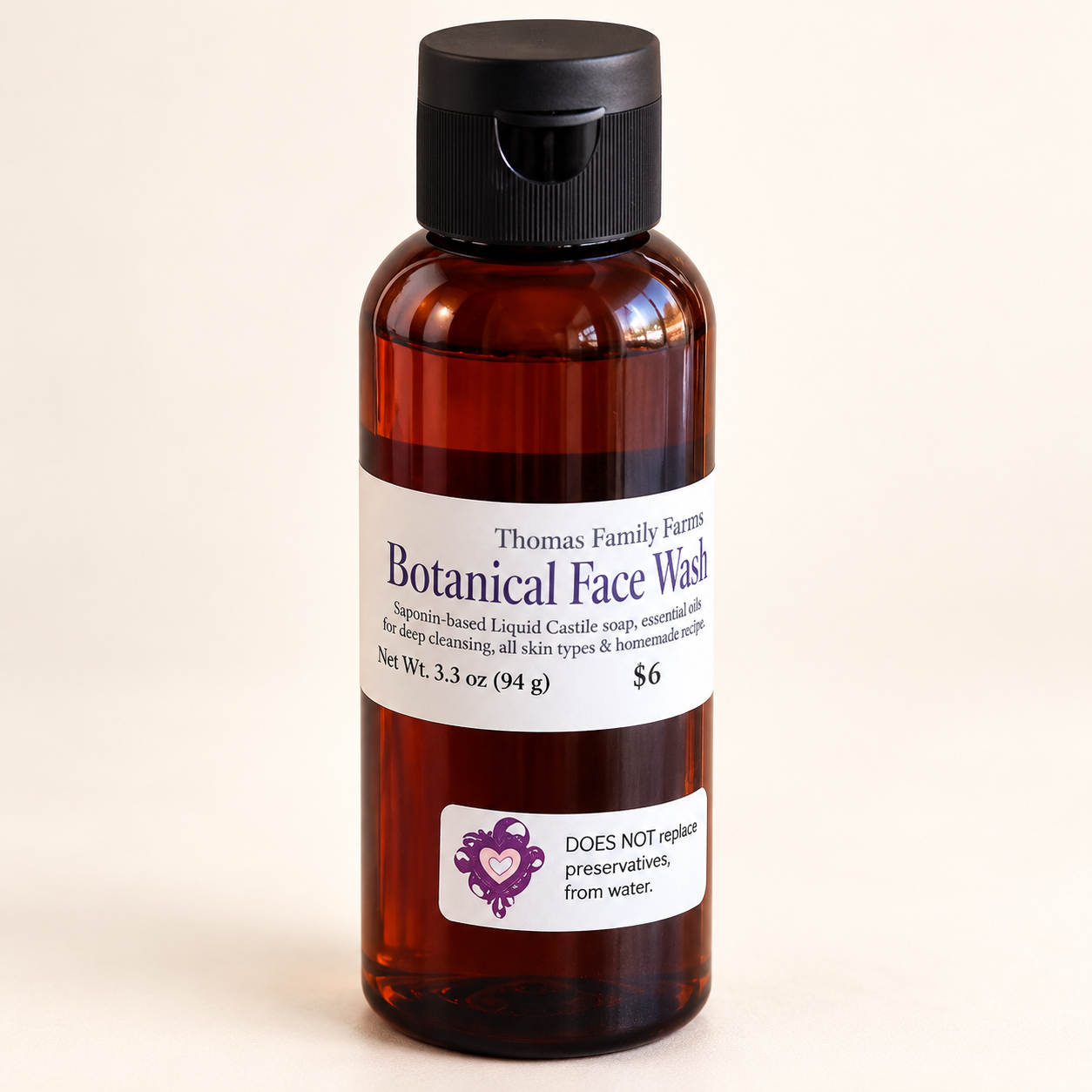 Thomas Family Farms Botanical Face Wash in an amber bottle with a black cap